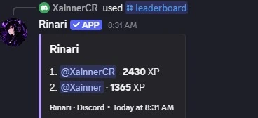 The /leaderboard answer with two members and their XP
